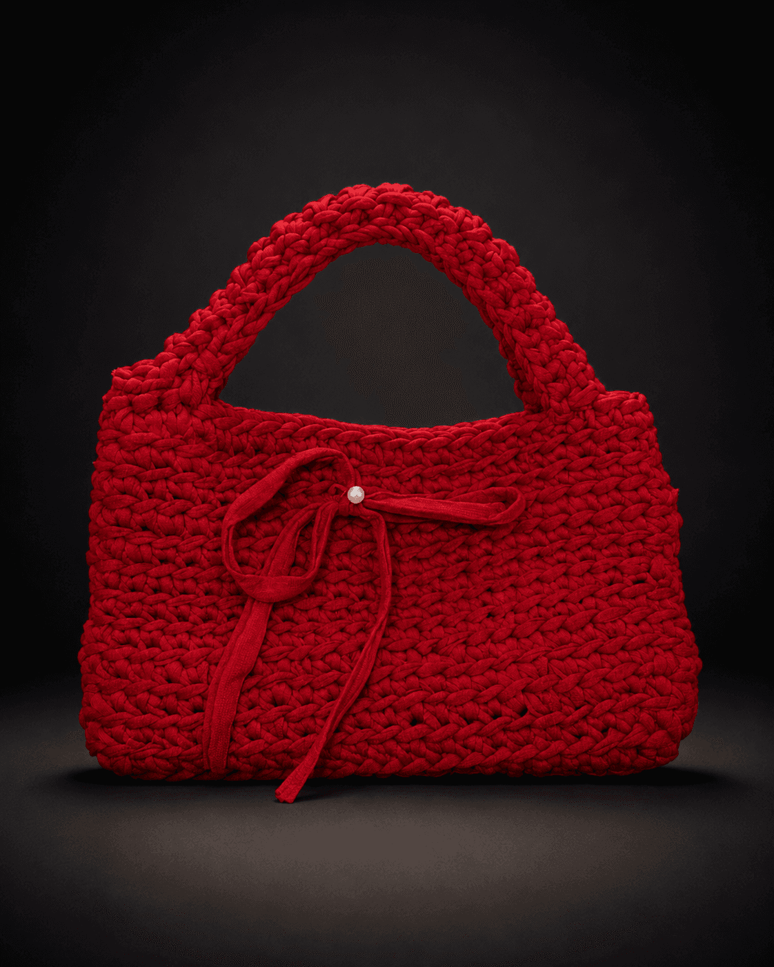 Rote handgemachte Tasche als Beispielstück